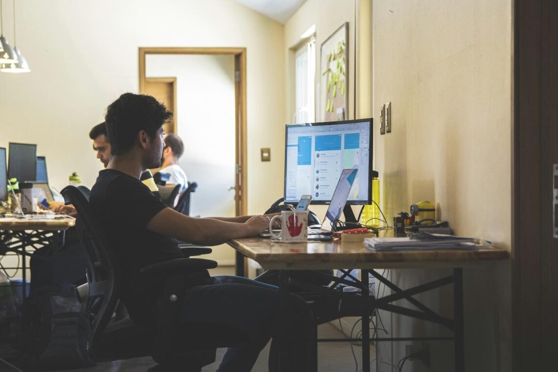 Sales Proposal Templates: Streamlining Your Workflow for Success 1 A desktop monitor with accounting software, highlighting the importance of sales proposal templates for businesses